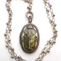 Fossil Brand cicada locket