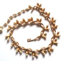 gilt pearl necklace