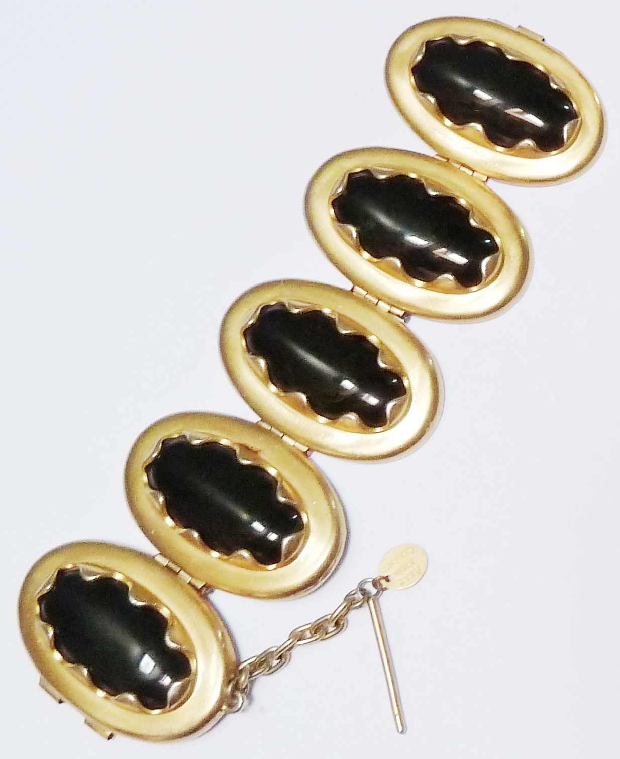 Gold black on sale stone bracelet