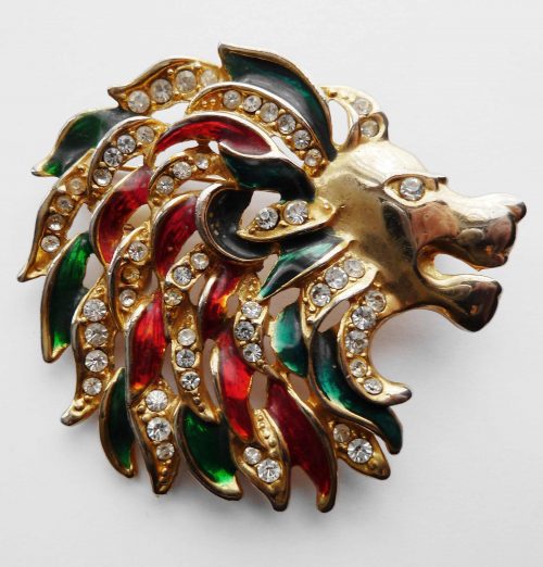 lion brooch red green black