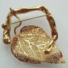 gilt leaf brooch back