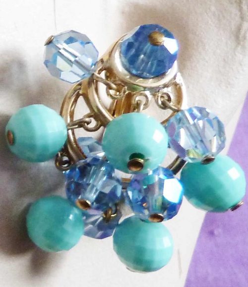Trifari blue bead clips on ear