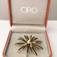 Ciro gilt black brooch in box