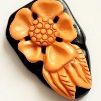 bakelite dress clip black yellow