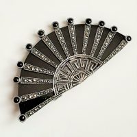 black and marcasite brooch