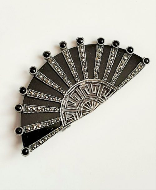 black and marcasite brooch