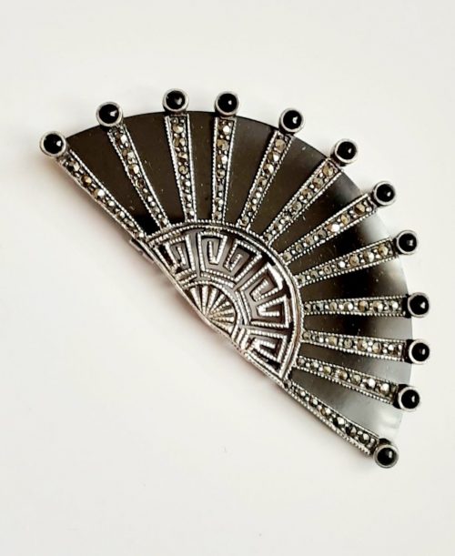 black and marcasite brooch