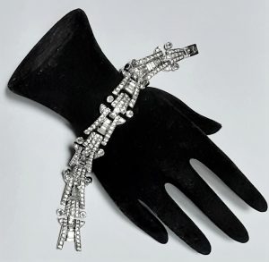 Ciro Pearls diamante bracelet on black hand