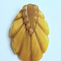 yellow bakelite dress clip