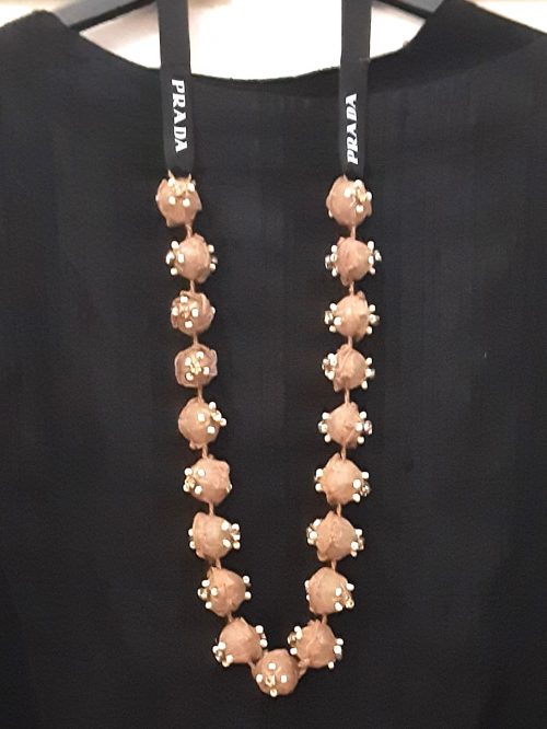 Prada beaded necklace on dress