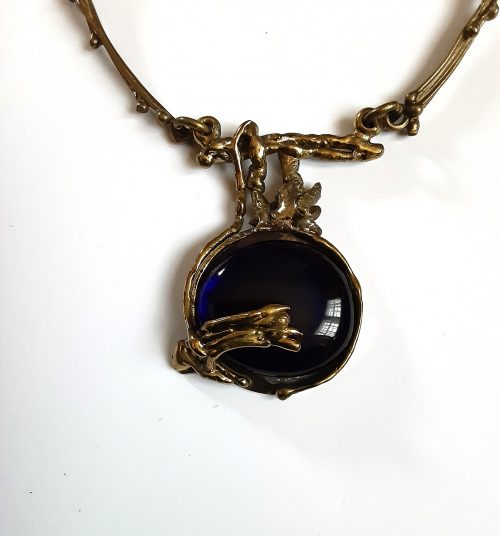 blue glass brass modernist necklace close up